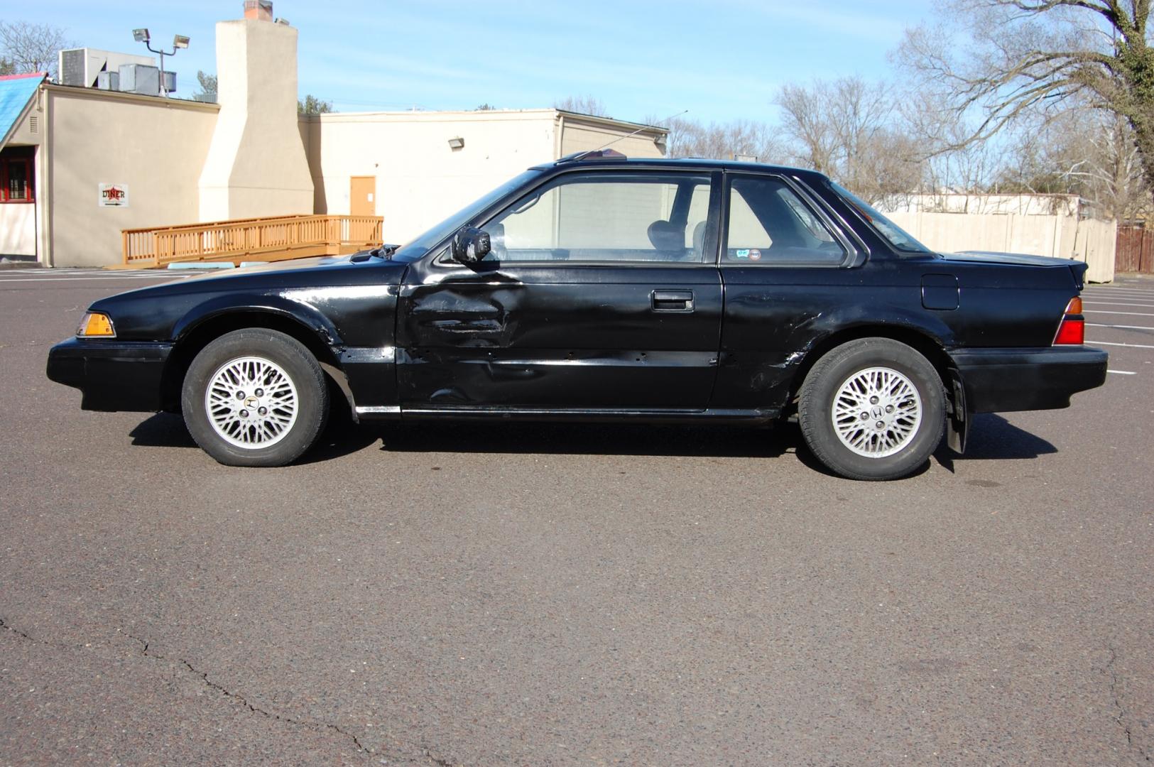 1987 Black /Gray Honda Prelude Si (JHMBA3248HC) with an 2.0L 4 cylinder engine, Automatic transmission, located at 6528 Lower York Road, New Hope, PA, 18938, (215) 862-9555, 40.358707, -74.977882 - Here we have a 1987 Honda Prelude SI with a 2.0L 4 cylinder putting power to the front wheels via an automatic transmission. Options include: gray cloth, power windows/locks/mirrors, AM/FM/TAPE radio, heat/AC, cruise control, tilt steering wheel, 13 inch alloy wheels, pop up headlights and a moon ro - Photo#5